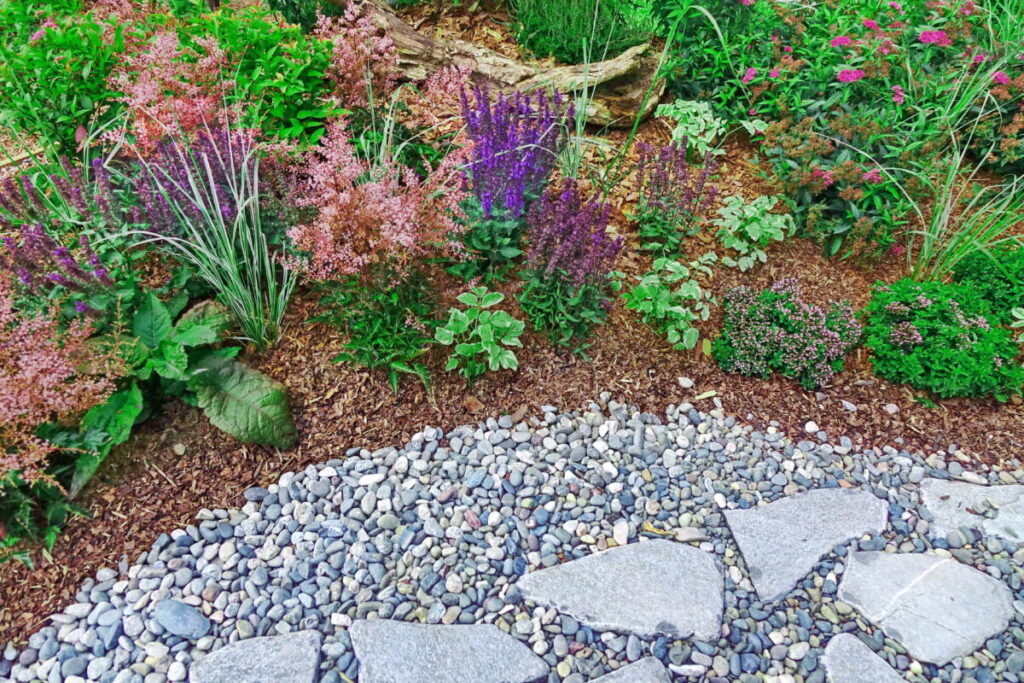 using gravel in your landscaping next to a flower bed